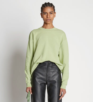 Front cropped image of model wearing Long Sleeve Sweatshirt in GREEN TEA