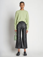 Front full length image of model wearing Long Sleeve Sweatshirt in GREEN TEA