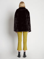 Back full length image of model wearing Faux Rabbit Peacoat in BLACK