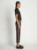 Side full length image of model wearing Scuba Short Sleeve Shirt in BLACK