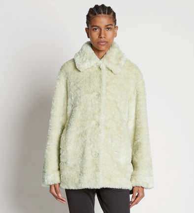 Front cropped image of model wearing Faux Rabbit Peacoat in GREEN TEA