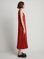 Side full length image of model wearing Pleatable Crepe Drawstring Dress in VERMILLION/BLACK