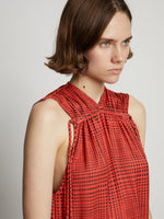 Detail image of model wearing Pleatable Crepe Drawstring Dress in VERMILLION/BLACK