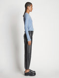 Side full length image of model wearing Cropped Turtleneck Chenille Sweater
 in PERIWINKLE