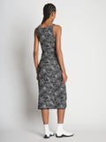 Back full length image of model wearing Speckle Knit Dress in PEARL/BLACK