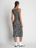 Back full length image of model wearing Speckle Knit Dress in PEARL/BLACK