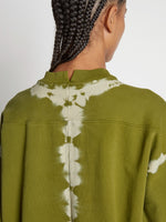 Detail image of model wearing Tie Dye Sweatshirt
 in AVOCADO/GREEN