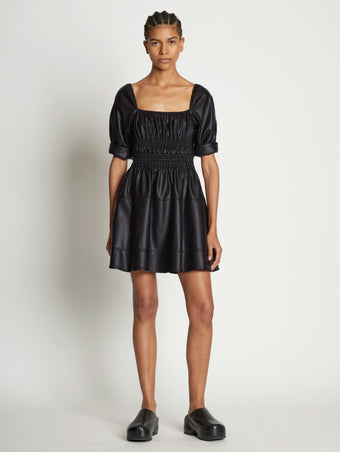 Front full length image of model wearing Faux Leather Square Neck Dress in BLACK