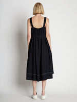 Detail image of model wearing Drapey Suiting Belted Dress in BLACK