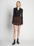 Front full length image of model wearing Satin Mini Skirt
 in MOCHA
