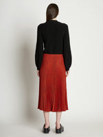Back full length image of model wearing Pleatable Crepe Midi Skirt
 in VERMILLION/BLACK