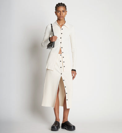 Front full length image of model wearing Rib Knit Button Front Skirt in CREAM