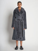 Front full length image of model wearing Faux Fur Belted Coat in DARK GREY