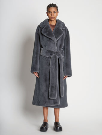 Front full length image of model wearing Faux Fur Belted Coat in DARK GREY
