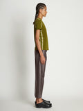 Side full length image of model wearing Tie Dye T-Shirt in AVOCADO/GREEN