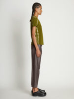 Side full length image of model wearing Tie Dye T-Shirt in AVOCADO/GREEN