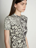 Detail image of model wearing Mixed Floral Short Sleeve Jersey Dress in PEARL/BLACK
