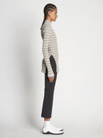 Side full length image of model wearing Stripe Knit Turtleneck in PERIWINKLE MULTI