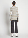 Back full length image of model wearing Stripe Knit Turtleneck in PERIWINKLE MULTI