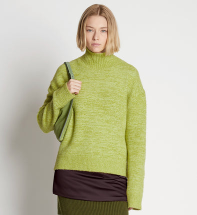 Front cropped image of model wearing Fluffy Knit Turtleneck Sweater in AVOCADO/HONEYDEW