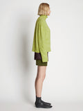 Side full length image of model wearing Fluffy Knit Turtleneck Sweater in AVOCADO/HONEYDEW