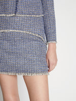 Detail image of model wearing Tweed Mini Skirt in BLUE MULTI