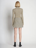 Back full length image of model wearing Tweed Mini Skirt in YELLOW MULTI