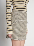 Detail image of model wearing Tweed Mini Skirt in YELLOW MULTI