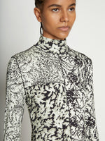 Detail image of model wearing Mixed Floral Jersey Top in PEARL/BLACK