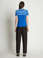 Back full length image of model wearing Tie Dye T-Shirt in BRIGHT BLUE/PERIWINKLE