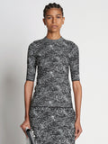 Front cropped image of model wearing Speckle Knit Sweater in PEARL/BLACK