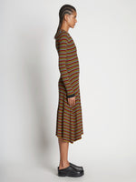 Side full length image of model wearing Stripe Knit Dress in VERMILLION MULTI