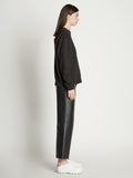 Side full length image of model wearing Long Sleeve Sweatshirt in BLACK