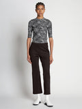 Front full length image of model wearing Scuba Cropped Flare Pants in BLACK