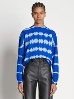Front cropped image of model wearing Tie Dye Sweatshirt in BRIGHT BLUE/PERIWINKLE