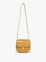 Front image of Mini Round Dia in CARAMEL with strap extended