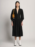 Front image of model carrying Mini Round Dia in CARAMEL