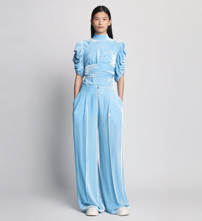 Front full length image of model wearing Silk Viscose Velvet Trousers in LIGHT BLUE