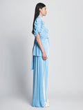 Side full length image of model wearing Silk Viscose Velvet Trousers in LIGHT BLUE