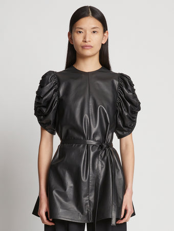Front cropped image of model wearing Leather Belted Top in BLACK