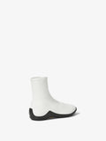 Back 3/4 image of Grip Stretch Ankle Boots in White