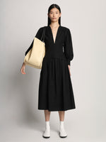 Front image of model wearing XL Ruched Tote in PALE YELLOW