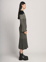 Side full length image of model wearing Boucle Mini Stripe Knit Dress in BLACK MULTI