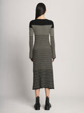 Back full length image of model wearing Boucle Mini Stripe Knit Dress in BLACK MULTI