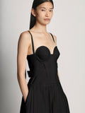 Detail image of model wearing Poplin Bustier Dress in BLACK
