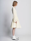 Side full length image of model wearing Viscose Crepe Jersey Dress in ECRU