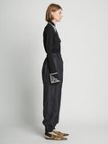 Side full length image of model wearing Silk Nylon Taffeta Pants in BLACK