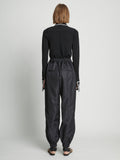 Back full length image of model wearing Silk Nylon Taffeta Pants in BLACK