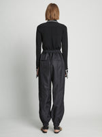 Back full length image of model wearing Silk Nylon Taffeta Pants in BLACK