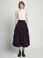 Front full length image of model wearing Poplin Belted Skirt in BLACK